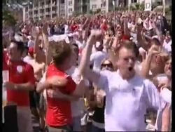 WRAP England fans watch match on banks of river Main News Clip