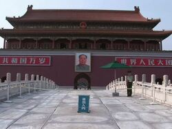 WS Hanging poster of Chairman Mao Zedong at Palace enterance / Beijing, China Stock Footage