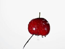 Spray water on red fruit, slow motion Stock Footage