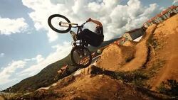 HD Super Slow-Mo: Bmx Dirt Backflip Trick Stock Footage