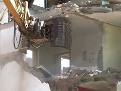 CU Demolition of apartment block / Saarburg, Rhineland-Palatinate, Germany Stock Footage