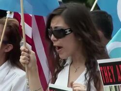 2009 ZO MS Protestors holding posters and flags and shouting slogans during an anti-China protest in support of the Uygurs/ Washington D.C., USA/ AUDIO Stock Footage
