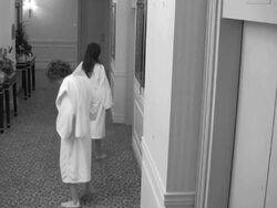 Impatient Couple Waiting for Hotel Elevator Stock Footage