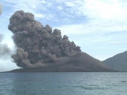 Large eruption of ash pours from crater of Krakatau volcano wide shot, Krakatoa, Indonesia, November 2010 Stock Footage
