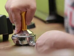 Tamping Fresh Ground Coffee Stock Footage