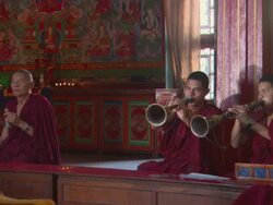 MS Buddhist monk ringing bell while two younger monks playing kangling at band practice / Kathmandu, Central Region,Nepal Stock Footage