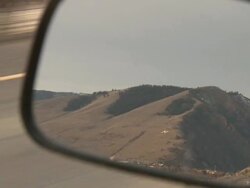 CU POV View of Missoula-M in rear view mirror / Missoula, Montana, United States Stock Footage