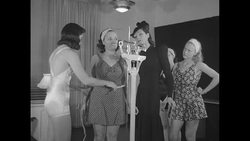 Female students getting weighed and their height measured at Success School at Richard Hudnut Beauty Salon in NY City News Clip