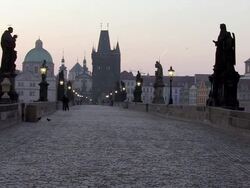 MS Street lamps shut down at charles bridge at early morning / Prague, Hlavni mesto Praha, Czech Republic Stock Footage