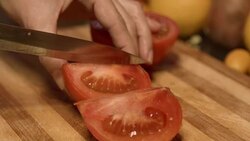 Cutting Tomatoes Into Parts Stock Footage