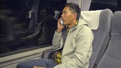 A Man using smartphone in train Stock Footage