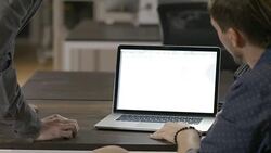 Two young entrepreneur businessmen working late in the office Stock Footage