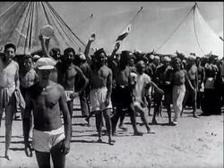 PRISONERS FROM LIBYA ARE HAPPY BEHIND WIRE - News Clip