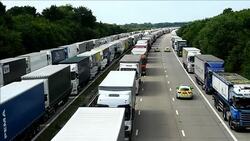 CLEAN : Calais strike clogs British motorway with 3,000 trucks News Clip