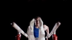SLO MO Gymnast on parallel bars performing routine Stock Footage