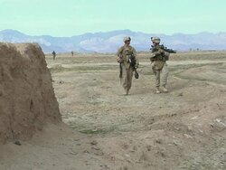 February 2009 WS Soldiers walking in desert / Bakwa, Farah Province, Afghanistan Stock Footage