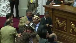 CLEAN : Venezuela legislature swears in three contested lawmakers News Clip