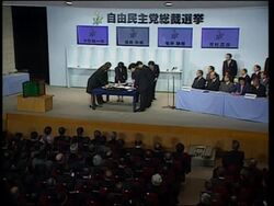 Koizumi re-elected head of Japan's ruling party News Clip