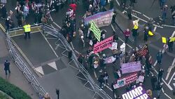 Aerial shots of the protest march through London against Donald Trump's 'Muslim ban' News Clip