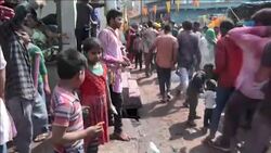 CLEAN : Barsana locals celebrate the colourful Lathmar Holi Festival News Clip
