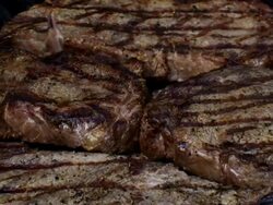 Grilled Rib Eye Steaks Stock Footage