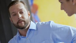 Restaurant owner instructs staff in daily team meeting Stock Footage