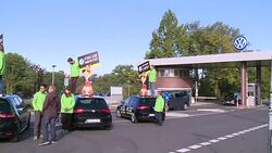 CLEAN : Greenpeace demonstrates at Volkswagen HQ News Clip