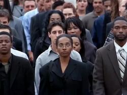 Slow motion medium shot DEFOCUS crowd walking towards CAM Stock Footage