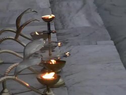 MS Oil lamps at ganges river bank / Rishikesh, Uttarakhand, India Stock Footage