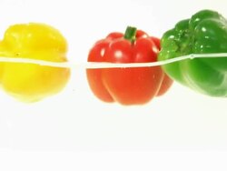 red, yellow and green pepper Splashing Stock Footage