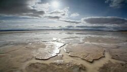 Dry, cracked earth and clouds Stock Footage