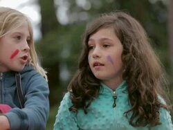  TU Young friends wearing face paint chatting in the woods / Vancouver, British Columbia, Canada Stock Footage