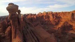 Aerial shot turn to reveal the Tower Arch at The Arches National Park Stock Footage