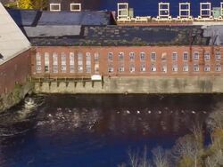 WS ARIEAL View of Flowing water with warning board / Maine, United States Stock Footage