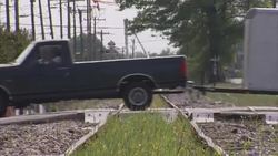 Railroad crossing and main street of Mooresville News Clip