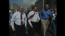 Giuliani touring Ground Zero with press News Clip