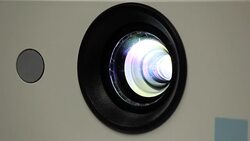 Light beam Projector lens close up Stock Footage