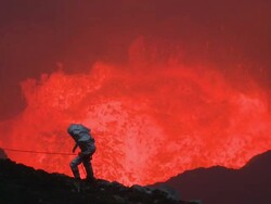 Volcanologist descends into violently erupting volcano, Marum Volcano, Ambrym Island, Vanuatu Stock Footage