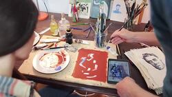 Painting teacher and student in the art studio. Stock Footage