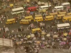 WS AERIAL View of market street and yellow cabs in line / Lagos, Nigeria Stock Footage