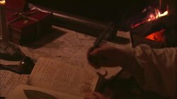 A scribe uses a quill to make a journal entry. Stock Footage