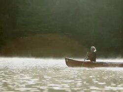  WS Couple rowing a boat across a lake / Stowe, Vermont, United States Stock Footage