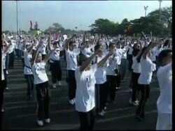 Thousands work up a sweat in world record exercise attempt News Clip