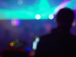 HD DJ in Disco Back View (Defocused) Stock Footage