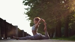 Young Woman Doing Yoga Meditation Exercises at Sunset Stock Footage
