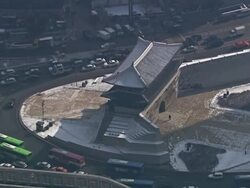 MS AERIAL ZI Shot of View of Namdaemun Gate(The first Korea National Treasure) and Cityscape / Seoul, South Korea Stock Footage