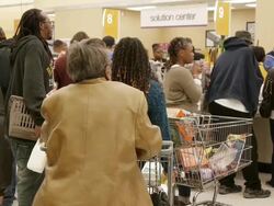 People wait in long lines at the grocery store Stock Footage