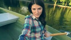 Woman taking selfies while rowing. Stock Footage