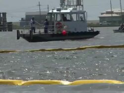 Vessels of Opportunity lay boom off Grande Isle Stock Footage