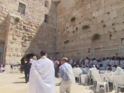 WS PAN Older man carrying Torah into Iron Gate near Western Wall / Jerusalem, Israel Stock Footage